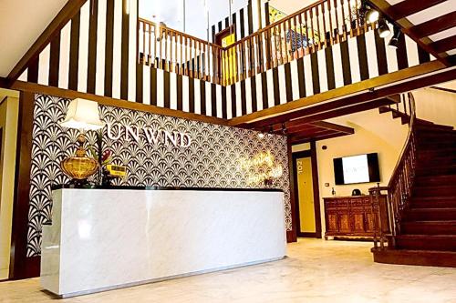The lobby or reception area at UNWND Boutique Hotel Dumaguete