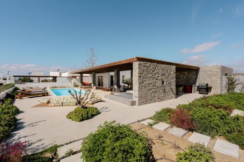 Κήπος έξω από το Citrus Seaside Houses