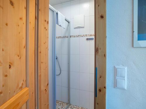 a shower with a glass door in a bathroom at Apartment in Bad Kleinkirchheim in ski area in Bad Kleinkirchheim
