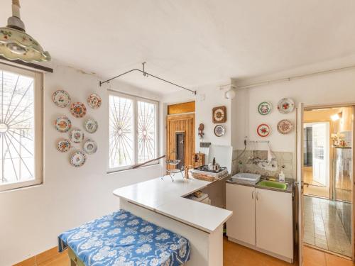 Η κουζίνα ή μικρή κουζίνα στο Cosy holiday home near Basilica