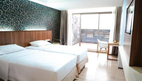 Photo de la galerie de l'établissement Sunrise Hotel Mojokerto, à Mojokerto