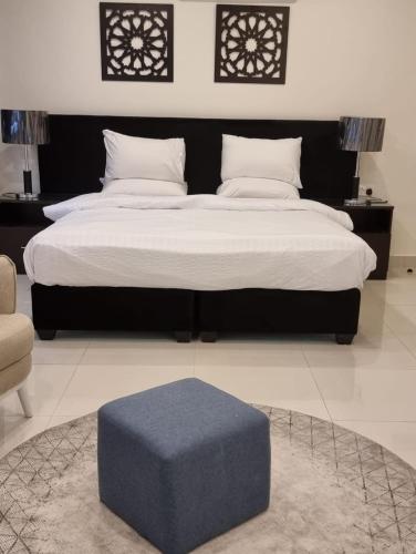 Una cama o camas en una habitación de Byblos Prime