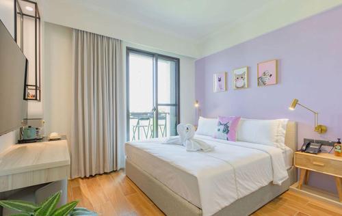 Una cama o camas en una habitación de Mika BnB