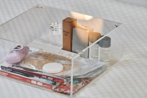 a clear plastic box with some items in it at Faik Pasha Hotels Special Category Beyoglu Istanbul in Istanbul