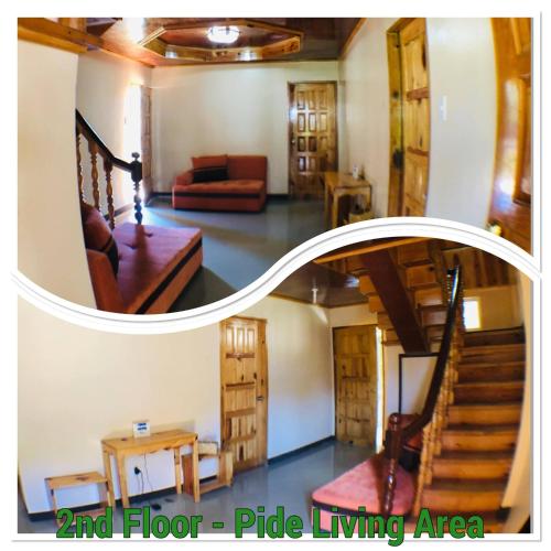 a living room with a staircase and floor plate living area at MOTHER MARRY INN in Sagada