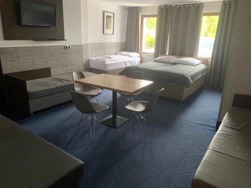 Ένα ή περισσότερα κρεβάτια σε δωμάτιο στο Hotel Alpenrose Gerlitzen