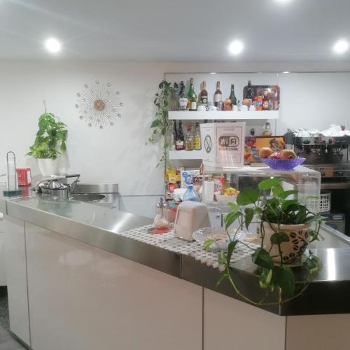 Η κουζίνα ή μικρή κουζίνα στο Piccolo Hotel Lamezia