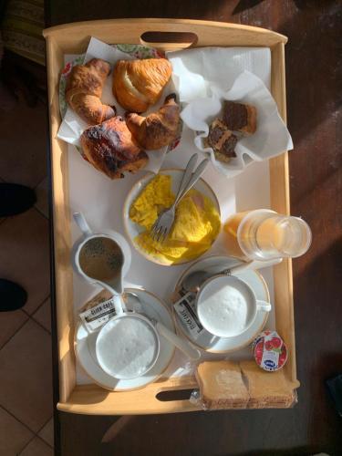 a wooden box filled with different types of food at Casale della rosa in Loreto