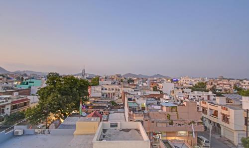 a view of a city with buildings at Treebo Paras Raj Near City Palace in Udaipur
