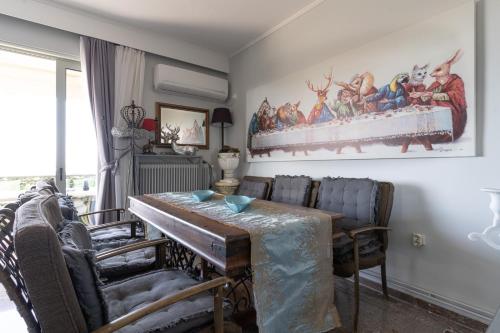 a dining room with a table and chairs at Ioanna's Hellenic Hospitality in Athens