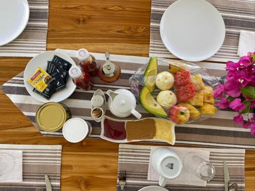 a table with a tray of food on a table at homeland bro in Dar es Salaam