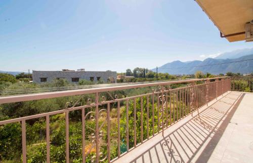 a balcony with a view of the mountains at Laconian Collection 'Magoula's Spacious Home' in Sparta