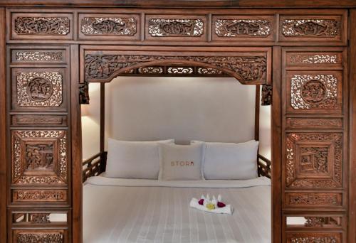 Ένα ή περισσότερα κρεβάτια σε δωμάτιο στο Storii By ITC Hotels, Shanti Morada Goa