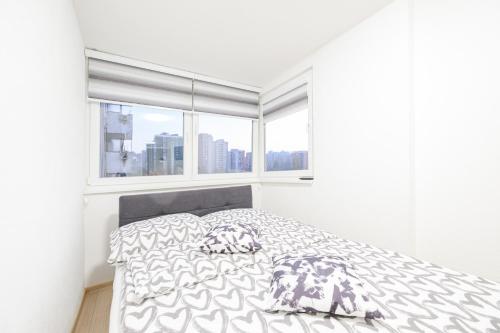Postel nebo postele na pokoji v ubytování Apartment UNA Alipasino with two bedrooms