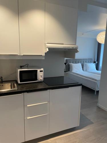 Kuchyň nebo kuchyňský kout v ubytování Magic Hotel & Apartments Kløverhuset