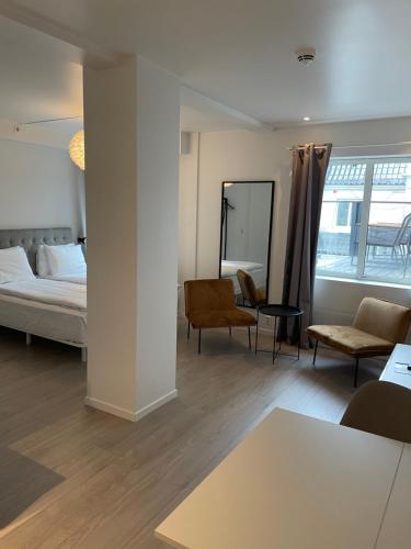 Postel nebo postele na pokoji v ubytování Magic Hotel & Apartments Kløverhuset