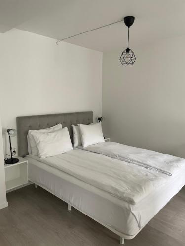 Postel nebo postele na pokoji v ubytování Magic Hotel & Apartments Kløverhuset