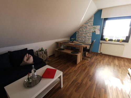 A seating area at 2,5 Zimmer Wohnung Hennef Nähe Siebengebirge