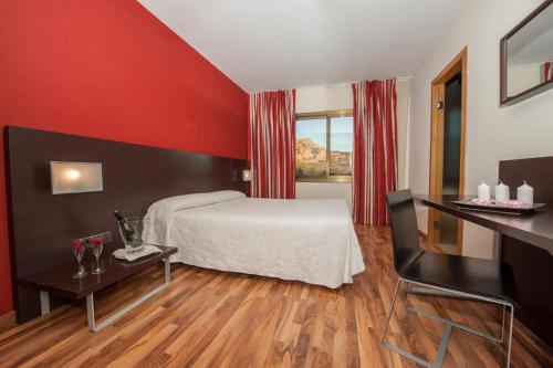Cama o camas de una habitación en Hotel Bruc