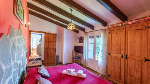 Postel nebo postele na pokoji v ubytování Casa Mulera Alozaina by Ruralidays