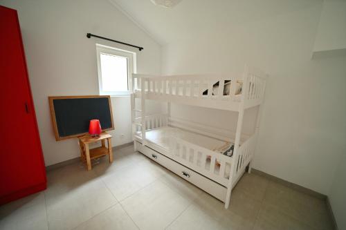  Rabais 57-58 -  Room  picture :   Private bathroom    Flat-screen TV   