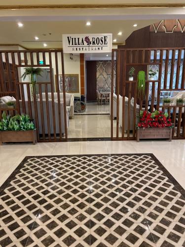 a lobby of a building with a lobbyasteryasteryasteryasteryasteryasteryasteryastery at Villa Park in Al Khobar