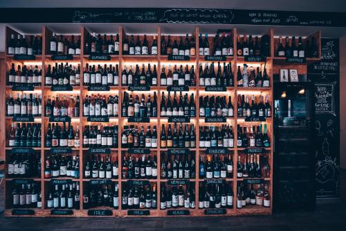 a display of bottles of wine in a store at Academic Apartment Brno (AAB) 2+1 (62 m²) in Brno