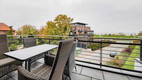 Balkón nebo terasa v ubytování Elbstrand Resort Krautsand