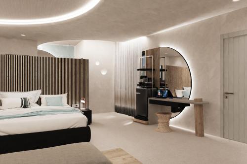 Säng eller sängar i ett rum på Brilliance of Mykonos