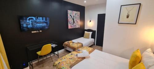 Posteľ alebo postele v izbe v ubytovaní 158 - Urban Louis Vuitton Flat in Montorgueil