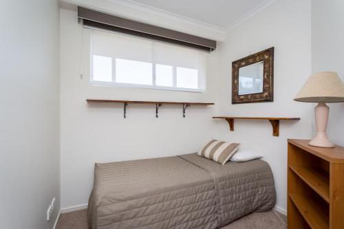 Postel nebo postele na pokoji v ubytování Kirra Beach Apartments