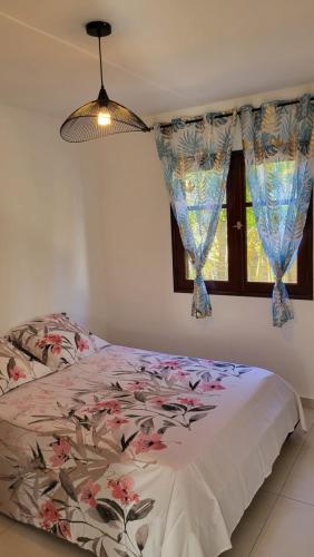 En eller flere senge i et værelse på Villa Creole alamanda 2
