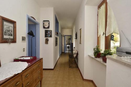 a hallway of a house with a sink and a window at CASA DELLA CIVETTA FELICE in Pergine Valsugana