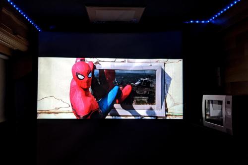 a screen with a picture of a spider man on it at Cara Noir in Inverness