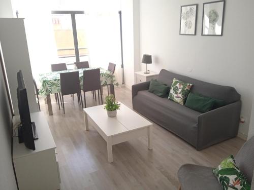 Zona de estar de Apartamento Con Encanto 'Larios Luxy'