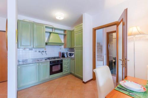 Kuchyň nebo kuchyňský kout v ubytování [Siena] Appartamento con splendido terrazzo