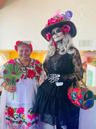 two people dressed up in day of the dead costumes at Tropical apartment in Cancún
