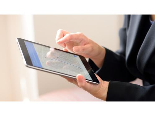 a person holding a cell phone in their hand at Hotel Tamano - Vacation STAY 41652v in Otawara