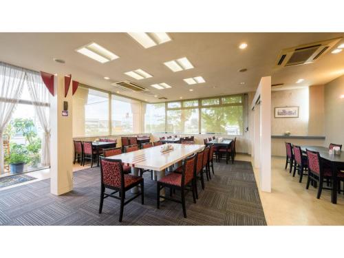 a dining room with a large table and chairs at Hotel Tamano - Vacation STAY 41648v in Otawara