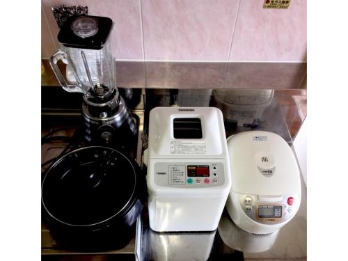 a blender and a food processor sitting on a counter at Hotel Sunset Zanpa - Vacation STAY 50194v in Tokeshi