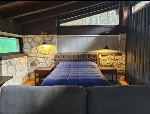 Un rincón en Huasca de Ocampo "El Principio"にあるベッド