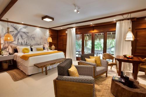 Katil atau katil-katil dalam bilik di Camurim Grande Pousada & SPA - Jantar Incluído