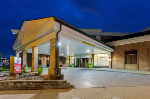 a building with a sign in front of it at Best Western Plus Wooster Hotel & Conference Center in Wooster