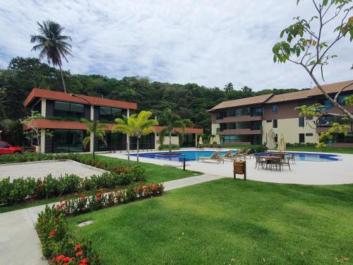 Swimmingpoolen hos eller tæt på Apartamento terreo no reserva dos Carneiros