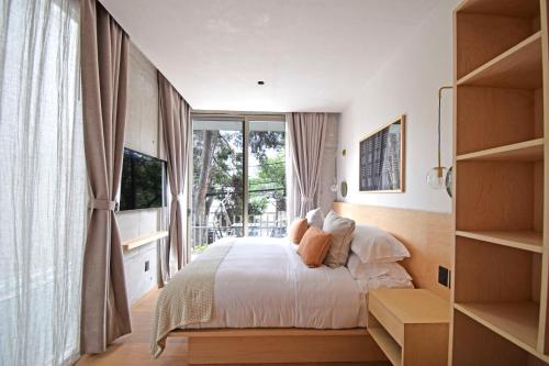Postel nebo postele na pokoji v ubytování Boutique Hotel Durango219