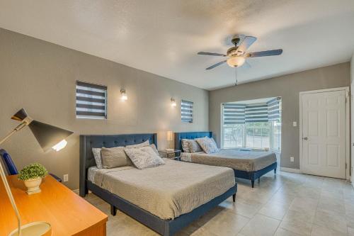 a bedroom with two beds and a ceiling fan at Close to All, Restful Duplex A in Downtown, UTEP, Hospitals in El Paso