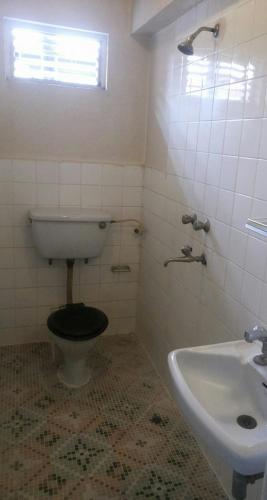 a bathroom with a toilet and a sink at Imperial House Thamel - 2 km from Swayambhunath Temple in Kathmandu