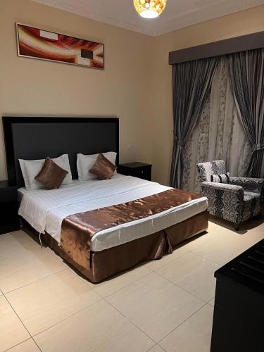 Ένα ή περισσότερα κρεβάτια σε δωμάτιο στο سما الطائف 2 للشقق المخدومة