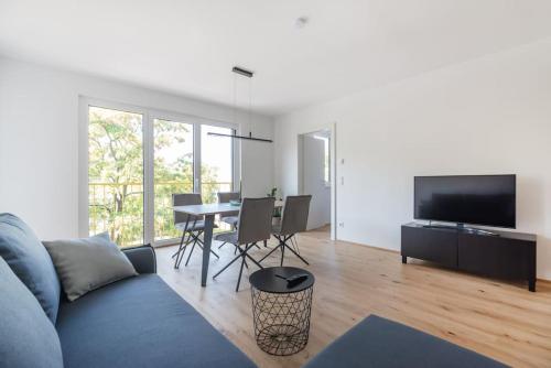 Grüne und zentrale Ruhelage im Neubau mit Balkon