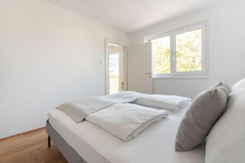 Grüne und zentrale Ruhelage im Neubau mit Balkon